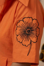 The Tangerine Statement Dress