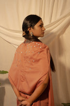 Draped gown with embroidery overlay