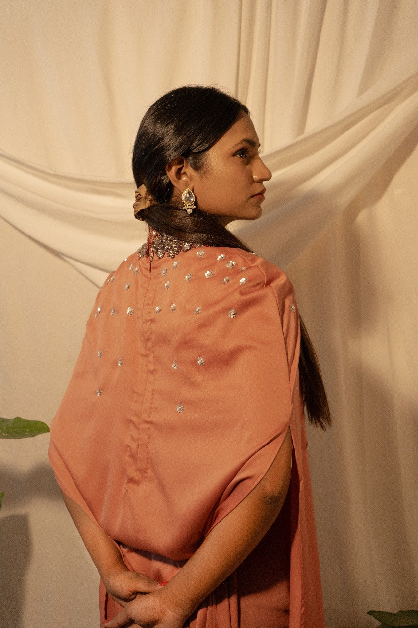 Draped gown with embroidery overlay
