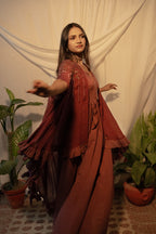 Pleated gown with shrug