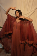 Pleated gown with shrug